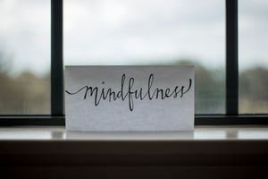 a paper that reads 'mindfulness'