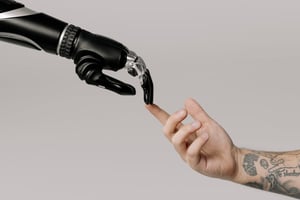 robotic hand and human hand