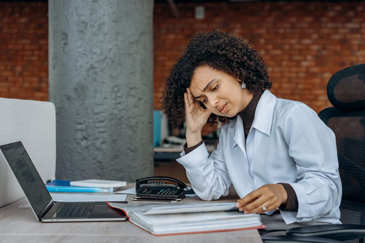 a woman sitting at a desk